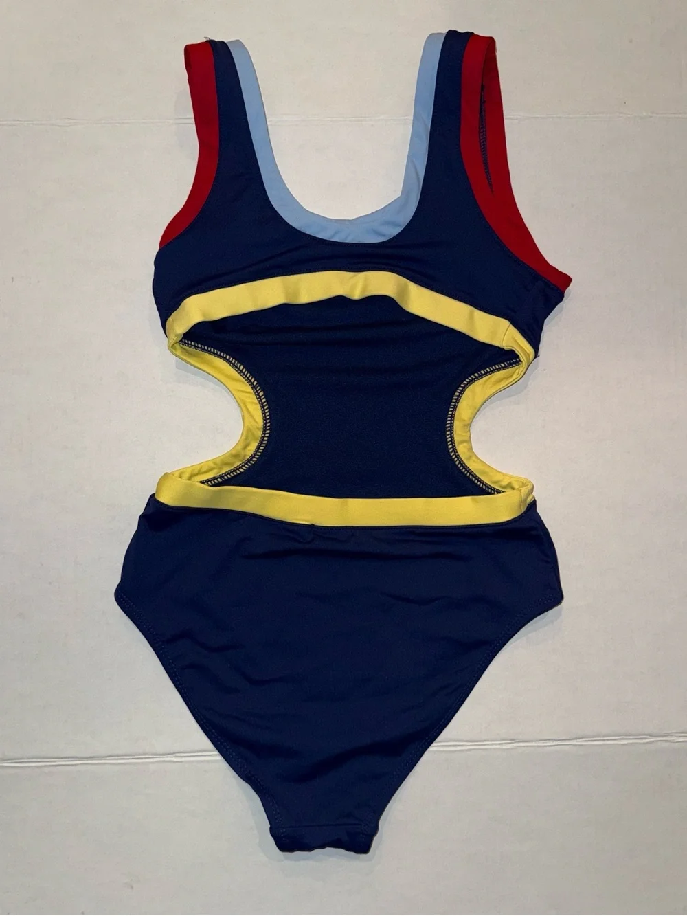Habitual Navy One-Piece with Red Shoulder Straps & Yellow Cutout Trim